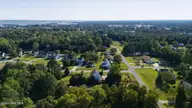 46 Pickett Way, Swansboro, NC 28584 — 4-bedroom waterfront home in Pickett Bay, Swansboro, NC, photo 14 of 19: 12-web-or-mls-DJI_20260930162756_0492_D
