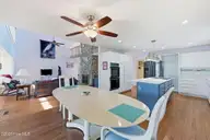 6106 Cardinal Drive, New Bern, NC 28560 — 3-bedroom waterfront home in Fairfield Harbour, New Bern, NC, photo 12 of 46: Living Area Opens to Kitchen