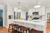 152 Arborvitae Drive, Pine Knoll Shores, NC 28512 — 3-bedroom waterfront home in Pine Knoll Association, Pine Knoll Shores, NC, photo 15 of 61: Kitchen