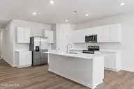 106 Nesbitt Court, Jacksonville, NC 28546 — 3-bedroom home in Muscadine, Jacksonville, NC, photo 19 of 32: Kitchen Island