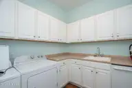 111 Graham Lane, Beaufort, NC 28516 — 6-bedroom home in Graham Subdivision, Beaufort, NC, photo 17 of 53: Large Laundry Room