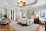 5307 Leisure Circle, Wilmington, NC 28409 — 3-bedroom waterfront home in Helms Port, Wilmington, NC, photo 18 of 55: Serene master bedroom with cozy nook