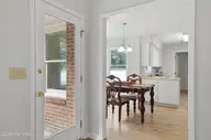312 Wendover Lane, Wilmington, NC 28411 — 3-bedroom home in Wendover, Wilmington, NC, photo 9 of 35: View into kitchen