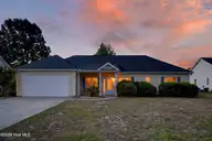 6404 Shire Lane, Wilmington, NC 28411 — 4-bedroom home in Belmar Forest, Wilmington, NC, photo 2 of 39: 6404ShireLane-2_Dusk
