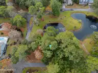 187 69 Clubhouse Drive SW, Supply, NC 28462 — waterfront lot in Lockwood Folly, Supply, NC, photo 3 of 27: DJI_0073_1