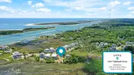 1347 Tidalwalk Drive, Wilmington, NC 28409 — waterfront lot in TidalWalk, Wilmington, NC, photo 2 of 78: 1347TidalwalkDriveDrone-Perks