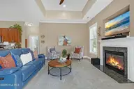 1226 Atrium Way, Leland, NC 28451 — 3-bedroom waterfront home in Waterford of the Carolinas, Leland, NC, photo 10 of 61: Living Room