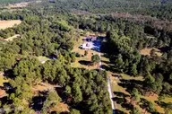 496 Yadkin Run Lane, Southern Pines, NC 28387 — 2-bedroom home in Horse Country, Southern Pines, NC, photo 1 of 67: 496 Yadkin drone-5