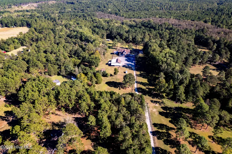 496 Yadkin Run Lane, Southern Pines, NC 28387 — 2-bedroom home in Horse Country, Southern Pines, NC, photo 1 of 67: 496 Yadkin drone-5