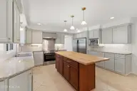 117 Hodges Street, Morehead City, NC 28557 — 4-bedroom home in Mitchell Village, Morehead City, NC, photo 7 of 63: Kitchen with wet bar