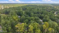 109 Riverview Drive, Washington, NC 27889 — 4-bedroom waterfront home in Pamlico Plantation, Washington, NC, photo 14 of 62: 14-web-or-mls-DJI_20260922115341_0387_D