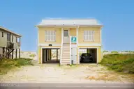 1025 W Beach Drive, Oak Island, NC 28465 — 3-bedroom waterfront home, Oak Island, NC, photo 1 of 45: 1025 W Beach 55