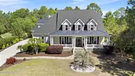 3902 Fairhaven Drive, Southport, NC 28461 — 3-bedroom waterfront home in St James, Southport, NC, photo 1 of 70: 80_DJI_20260410114239_0316_D