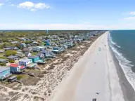 2205 E Beach Drive, Oak Island, NC 28465 — 6-bedroom waterfront home in Long Beach, Oak Island, NC, photo 15 of 55