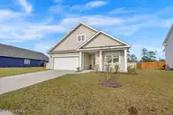 2052 Willowleaf Drive, Leland, NC 28451 — 4-bedroom home in Grayson Park, Leland, NC, photo 2 of 50: Front