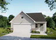 7438 Julius Drive NE 22, Leland, NC 28451 — 3-bedroom home in Coastal Haven, Leland, NC, photo 1 of 11: HONEYBIRD-TRADITIONAL-FRONT_DAY