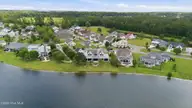 4030 Reunion Pointe Lane, New Bern, NC 28562 — 4-bedroom waterfront home in Carolina Colours, New Bern, NC, photo 15 of 73: 16-web-or-mls-DJI_20260617120014_0717_D
