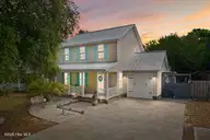 124 NE 15th Street, Oak Island, NC 28465 — 3-bedroom home in Long Beach, Oak Island, NC, photo 2 of 51: thumbnail-0196a7bc-fd13-72ef-9edf-f1b1e9