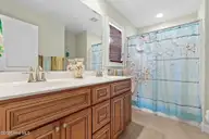 133 NE 3rd Street, Oak Island, NC 28465 — 3-bedroom home, Oak Island, NC, photo 13 of 27: Owners Retreat