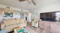 8801 Reed Drive 115, Emerald Isle, NC 28594 — 2-bedroom waterfront condo in Sound Of The Sea, Emerald Isle, NC, photo 6 of 47: Living/Dining Room Combination