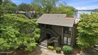 250 Sugar Gum Lane # 214, Pinehurst, NC 28374 — 2-bedroom waterfront condo in Lakeview Condos, Pinehurst, NC, photo 1 of 58: 4-web-or-mls-DJI_20260729133210_0053_D