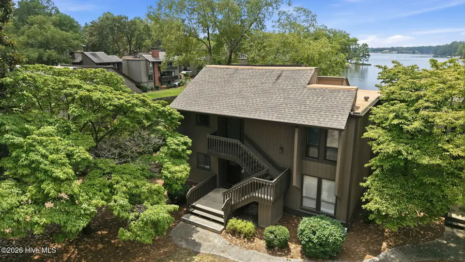 250 Sugar Gum Lane # 214, Pinehurst, NC 28374 — 2-bedroom waterfront condo in Lakeview Condos, Pinehurst, NC, photo 1 of 58: 4-web-or-mls-DJI_20260729133210_0053_D