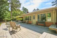 32 Bogie Drive, Whispering Pines, NC 28327 — 3-bedroom home in Whispering Pines, Whispering Pines, NC, photo 12 of 63: 13-17_32 Bogie Dr., WP_Exterior_Spring_L