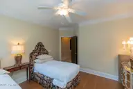 68 Abbottsford Drive, Pinehurst, NC 28374 — 4-bedroom home in Pinewild CC, Pinehurst, NC, photo 22 of 53: main level xbed1-2
