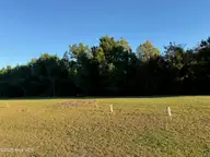 157 Whispering Pine Lane, Holly Ridge, NC 28445 — lot in Summerhouse On Everett Bay, Holly Ridge, NC, photo 1 of 27: IMG_1375