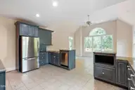 86 Plantation Passage Drive SE, Bolivia, NC 28422 — 4-bedroom waterfront home in Winding River Plantation, Bolivia, NC, photo 14 of 77: Kitchen