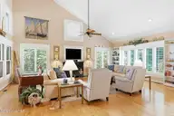 142 Oakleaf Drive, Pine Knoll Shores, NC 28512 — 3-bedroom home, Pine Knoll Shores, NC, photo 7 of 39: Living Room