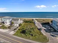 402 1 Fort Fisher Boulevard N, Kure Beach, NC 28449 — waterfront lot in Kure Dunes, Kure Beach, NC, photo 4 of 55: 14-web-or-mls-DJI_20251022155821_0930_D