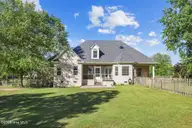 117 Oak Summit Drive, Pikeville, NC 27863 — 3-bedroom home in Oak Summit, Pikeville, NC, photo 6 of 59: 117 Oak Summit Dr Rear View
