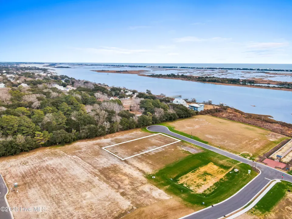 100 100 N Glimmering Glass Lane, Hampstead, NC 28443 — waterfront lot in East Wynd, Hampstead, NC, photo 1 of 32: 012_lot_100_north_glimmering_glass_lane_
