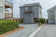 4414 Island Drive, North Topsail Beach, NC 28460 — 4-bedroom waterfront home in Summertyme, North Topsail Beach, NC, photo 1 of 58: 4414 Island Drive - Aerial - Edited_15