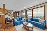 111 Dogwood Circle, Pine Knoll Shores, NC 28512 — 4-bedroom waterfront home in Pine Knoll Association, Pine Knoll Shores, NC, photo 20 of 52: Living room with fireplace