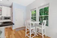 121 Sea Isle North Drive & Slip 20, Indian Beach, NC 28512 — 3-bedroom waterfront home in Sea Isle Plantation North, Indian Beach, NC, photo 7 of 53: Elevator and casual dining