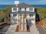 3804 Emerald Drive W, Emerald Isle, NC 28594 — 4-bedroom waterfront townhome in Emerald Isle By The Sea, Emerald Isle, NC, photo 1 of 46: New construction duplex on sound
