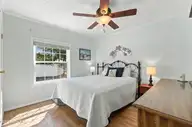 166 NE 5th Street, Oak Island, NC 28465 — 3-bedroom home in Tranquil Harbor, Oak Island, NC, photo 21 of 59: 26_bedroom 2