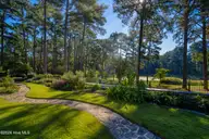 667 Yadkin Road, Southern Pines, NC 28387 — 5-bedroom home in Horse Country, Southern Pines, NC, photo 5 of 26: grounds1