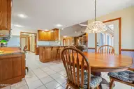 1461 S Shore Drive, Southport, NC 28461 — 3-bedroom waterfront home, Southport, NC, photo 16 of 75: Dining Room & Kitchen