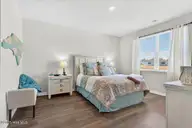 1271 Rippling Cove Loop SW, Supply, NC 28462 — 3-bedroom waterfront home in Stanbury Creek, Supply, NC, photo 16 of 53: Primary Bedroom