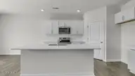 707 Lazy Elm Lane, Aberdeen, NC 28315 — 5-bedroom home in Collinswood, Aberdeen, NC, photo 6 of 38: Kitchen