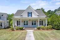 321 Jenoa Drive, Castle Hayne, NC 28429 — 3-bedroom home in River Bluffs, Castle Hayne, NC, photo 1 of 68: 1_front exterior