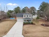 893 Dan Owen Drive, Hampstead, NC 28443 — 5-bedroom home in Majestic Oaks West, Hampstead, NC, photo 2 of 72: 3-web-or-mls-DJI_20260302112613_0750_D