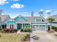 6415 Bryson Drive SW, Ocean Isle Beach, NC 28469 — 3-bedroom home in Retreat At OIB, Ocean Isle Beach, NC, photo 1 of 64: Front of home