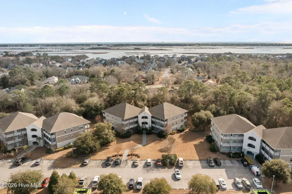 200 Lighthouse Lane A1, Cedar Point, NC 28584 — 2-bedroom condo in Village at Magens Bay, Cedar Point, NC, photo 1 of 33: ARIAL VIEW WITH SOUND NEARBY