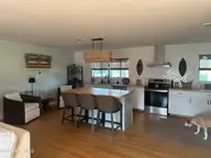 2182 Crusoe Island Road, Whiteville, NC 28472 — 3-bedroom home, Whiteville, NC, photo 7 of 24: kitchen from living
