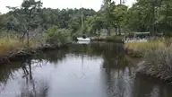 323 10A Clearview Drive, Holly Ridge, NC 28445 — waterfront lot in Mainlander Estates, Holly Ridge, NC, photo 1 of 16: Waterside on Turkey Creek