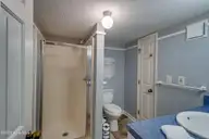 10300 Coast Guard Road E103, Emerald Isle, NC 28594 — 3-bedroom waterfront condo in Point Emerald Villas, Emerald Isle, NC, photo 23 of 47: Guest Bath